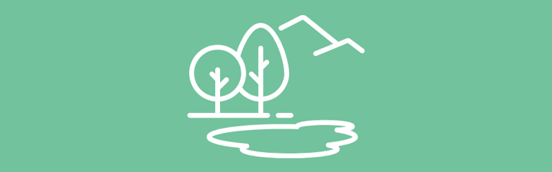 Ikon med to træer og en sø